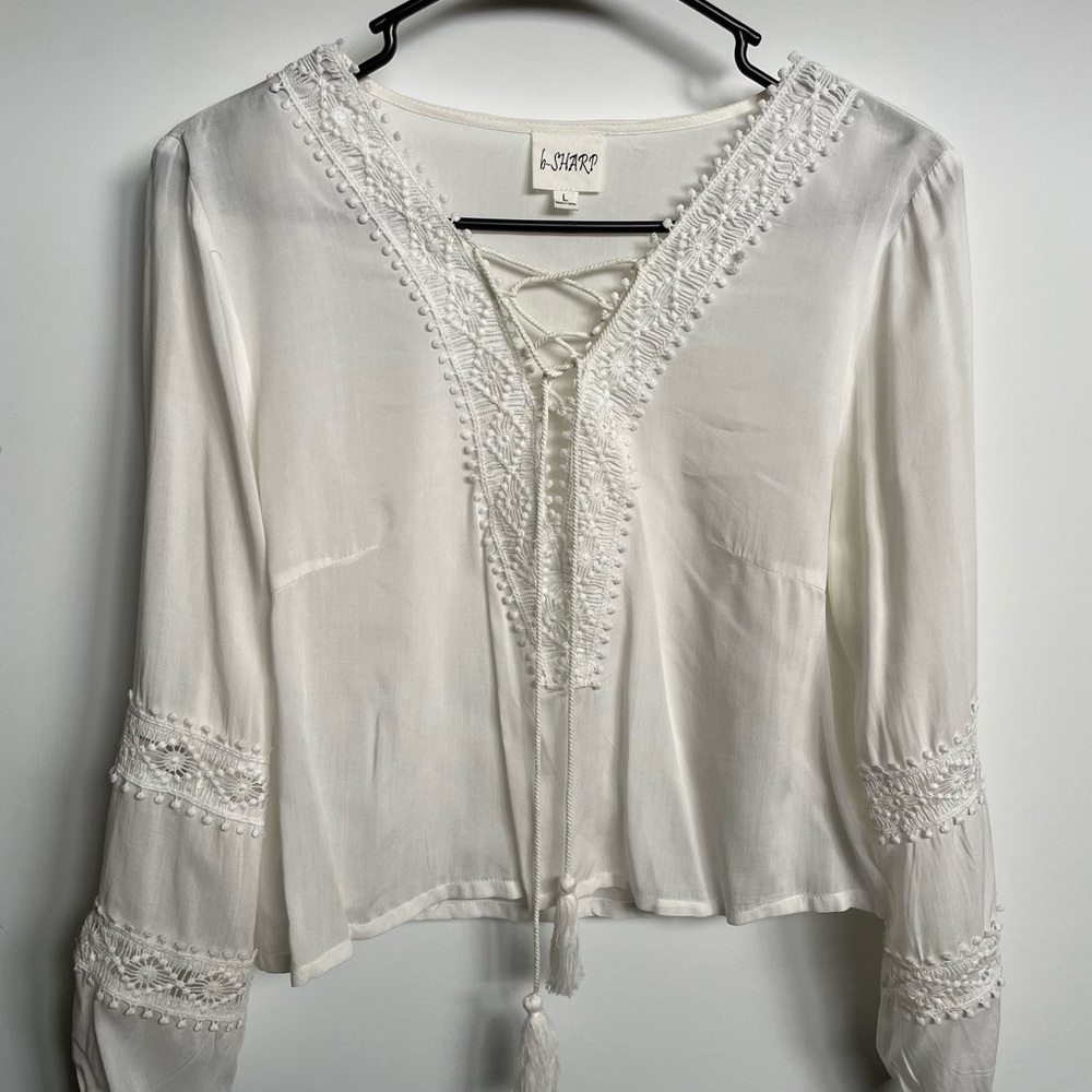Chic White Lace-Up Blouse by Sharp